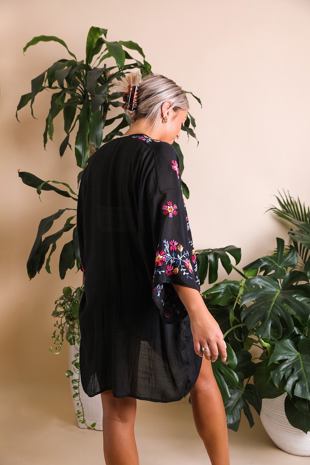 Stylish floral garland embroidered black kimono cardigan.