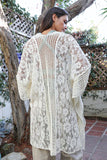 Ivory floral knit pattern kimono with breathable, lightweight texture.