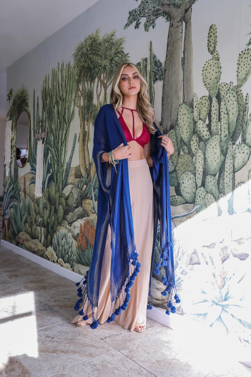 Flowing tassel border longline navy kimono, ideal for versatile layering options.